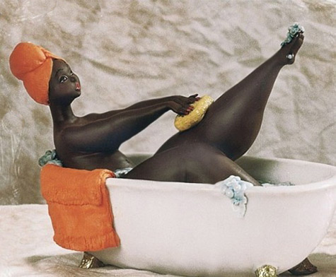 Emilio-Cassarotto-bathing-figurine Emilio Cassarotto figurine of an ebony skin lady bathing in a bathtub