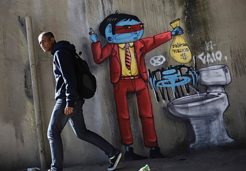 A-piece-by-the-Brazilian-artist-Cranio-depicting-a-man-flushing-money-down-a-toilet-bowl