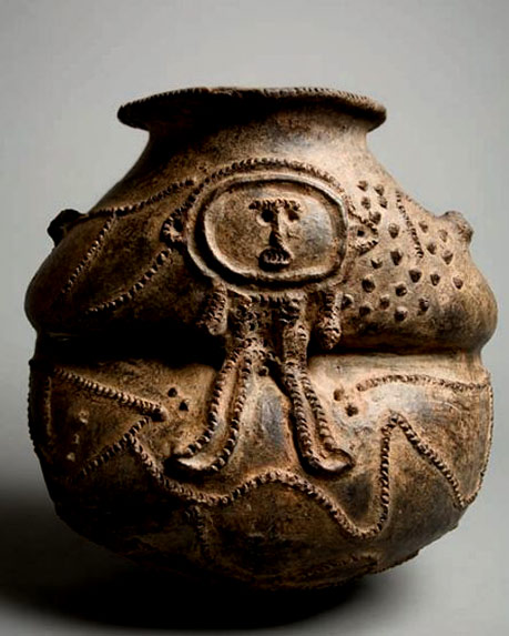 A-vessel-from-the-Mambila-peoples-~-Nigeria,-Cameroon Mambila peoples ceramic ritual vessel, spaceman like motif -~-Nigeria,-Cameroon