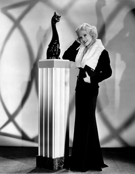 Alice-Faye-1935 with black cat sculpture Alice-Faye-1935 with black cat sculpture on a pedestal