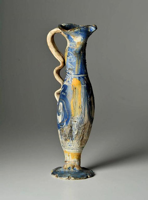 Alice-Frederico-footed-vessel Alice Frederico footed vessel with curvy ribbon handle--17.5 inches height