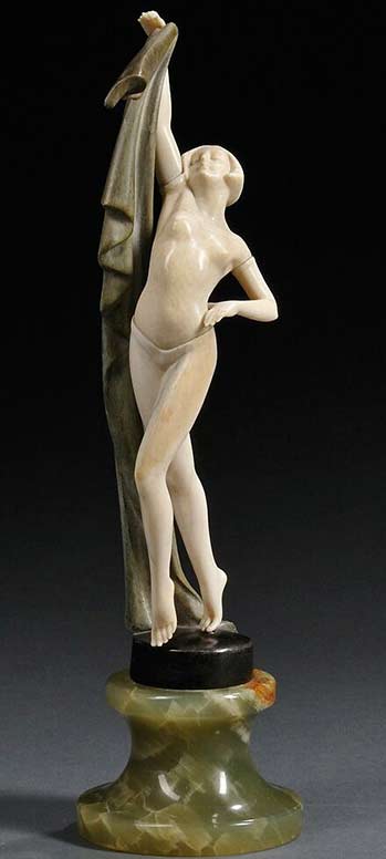 An-Art-Deco-bronze-and-ivory-figure-by-J-Ulrich,-Austria-ca Art-Deco-bronze-and-ivory-figure-by-J-Ulrich
