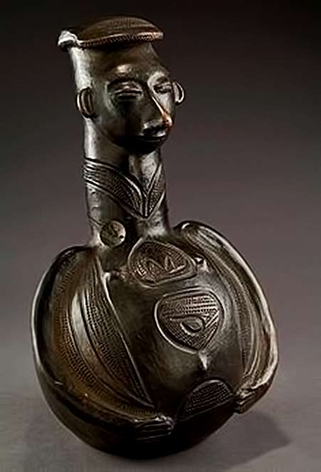ANTHROPOMORPHIC-ZANDE,-DRC-globular,-Aved-arms-printed-in-relief,-neck-shaped-human-head-with-delicately-carved-features,---beautiful-black-slip