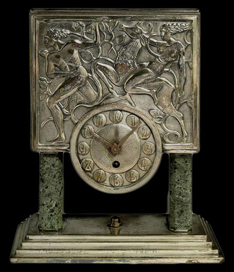 ART-DECO-MANTEL-CLOCK-CIRCA-1930 Art Deco mantle clock with silver relief panel