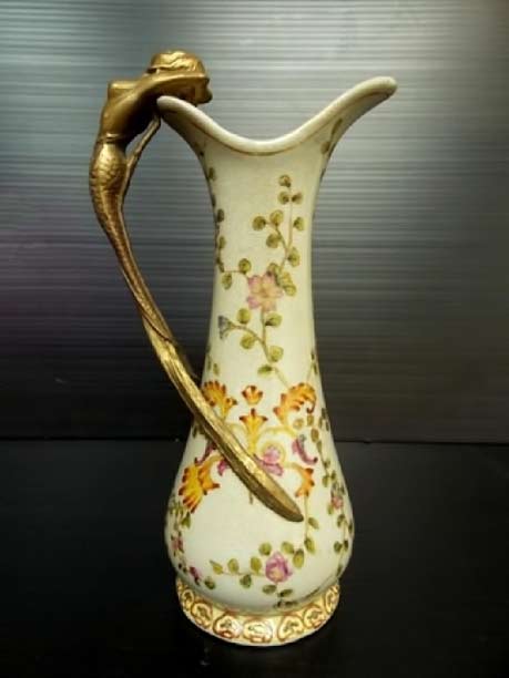 Porcelain and bronze mermaid pitcher Art Nouveau Porcelain and bronze mermaid pitcher with floral decoration
