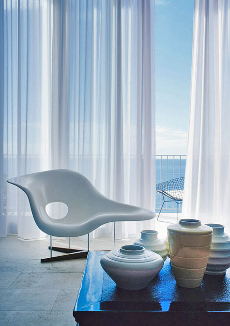 Iain-Halliday-Palm-Beach-decor Iain Halliday’s Palm Beach home features an Eames La Chaise by Vitra, and ceramics by Keith Murray for Wedgwood.
