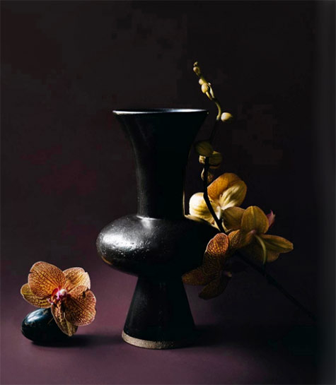 Black-trumpet-vase-Nicolette-Johnson Black-trumpet-vase-with orchids -- Nicolette-Johnson