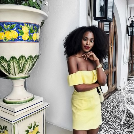 co-ordinated-yellows--model and planter Model color coordinated with planter