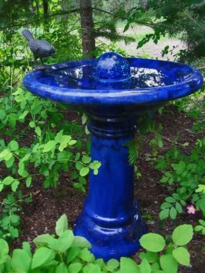 Cobalt-blue-birdbath-in-the-garden Cobalt-blue-birdbath