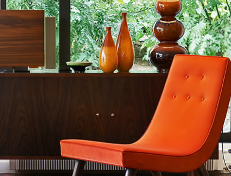 Mid-century-decor decor8-gr mid century lounge chair and vases in orange