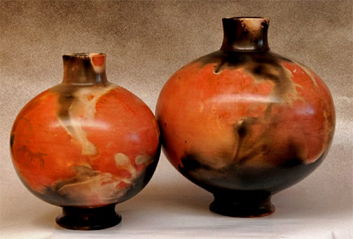 Donve-Branch-afro-pottery Two orange and black globular vessels - Donve BRanch