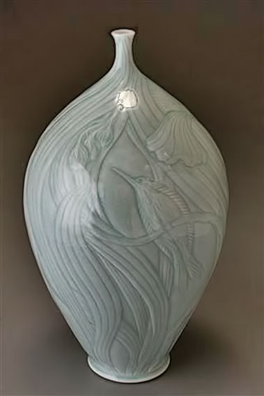 Elaine-Coleman-incised-vessel Elaine-Coleman-14x7-inches,-thrown-and-incised-porcelain,-light-blue-celadon-glaze