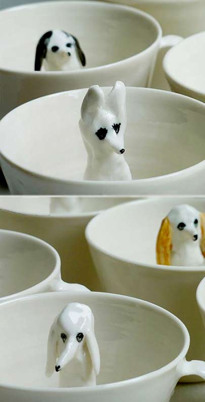 eleonor-bostrom-ceramic-figurine-cups Eleonor Bostrom ceramic drinking cups with internal dog figures