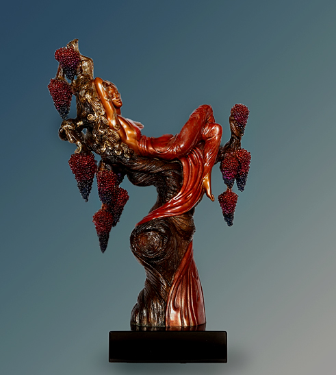 erte-french-sculpture Erte Heat sculpture lady in a red gown relaxing on a tree