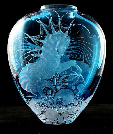Exhibition-2012-sea horse-vase-Guild-of-Glass-Engravers. Turquoise sea horse engraved glass vase -Guild-of-Glass-Engravers.