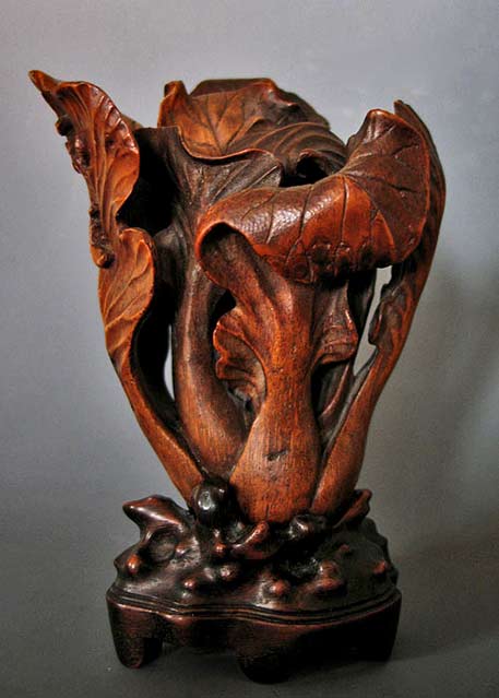 Exquisite-and-very-rare-Chinese-bamboo-carving Chinese bamboo carving-in the form of a baicai with two praying mantises in reliefon-the-underside-of-one-leaf