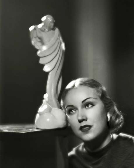 Fay-WrayRay-Jones-(1900-1975)-Head-of-Universal’s-still-photography Fay-Wray posing with white art deco sculpture