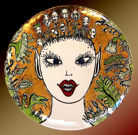 Fire-spirit---plate,-earthenware-with-glazes-and-enamels,-27-x-27cm Fire-spirit---plate - female face - Jenny Orchard