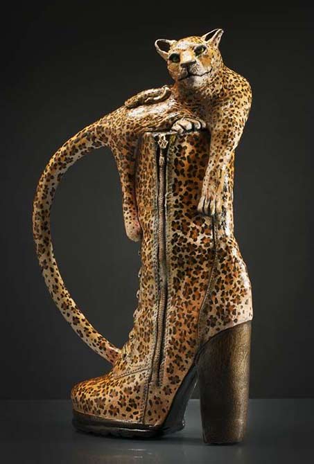 Fit-to-a-Tea-is-a-teapot-in-the-form-of-a-leopard-patterned-boot-surmounted-by-an-emerging-leopard Leopard in a leopard skin boot teapot