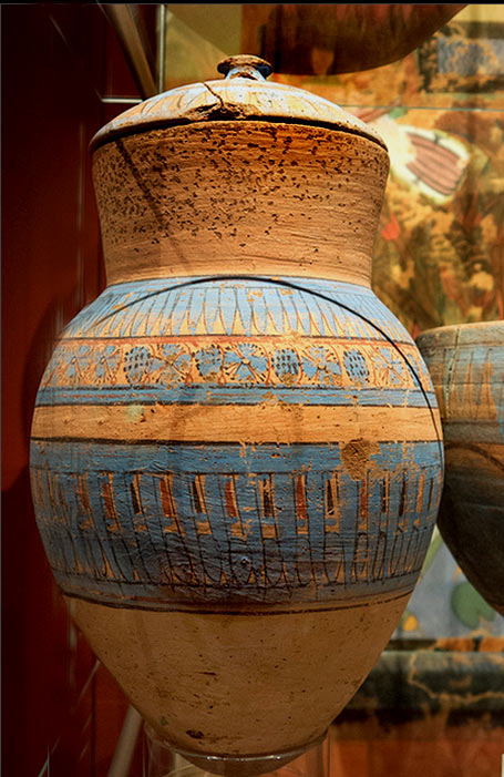 blue painted terracotta jar-egypt-455x701 Egyptian blue painted terracotta jar decorated with geometric styled flowers and grapes, and a jar lid.