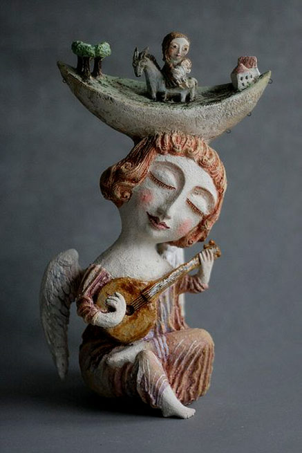 Flight-into-Egypt---Elya-Yalonetski Flight into Egypt---Elya Valonetski a girl playing a mandolin with a crescent moon hat