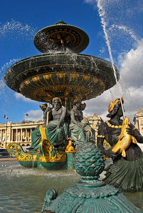 Fontaine-des-Mers,-Place-de-la-Concorde,-Paris,-France Fontaine-des-Mers,-Place-de-la-Concorde fountain in Paris with strong water jets