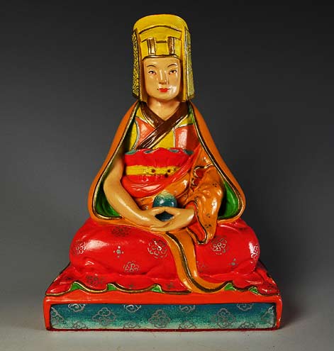 seated-gampopa-sculpture gampopa - was the foremost disciple of Milarepa,dressed in red