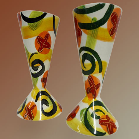 Glazed-Pottery-Goblets-by-Marilee-Hall Glazed Pottery Goblets by Marilee HallBold-shades-of-red,-orange,-yellow-and-green-on-white