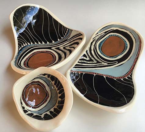 Gorrogarrah-Binjdil----Three amorphic dishes Three amorphic dishes with aboriginal art decoration