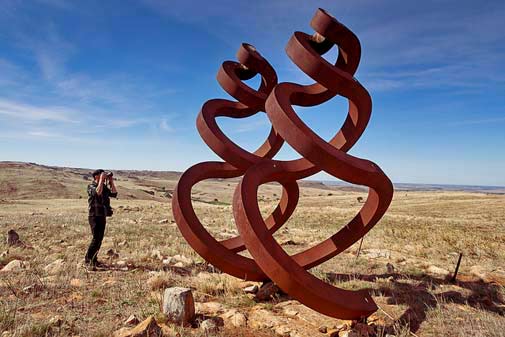 Greg-Johns-sculpture-palmer-Biennial greg-johns-guardian-figures-permanently-on-property-bill-doyle