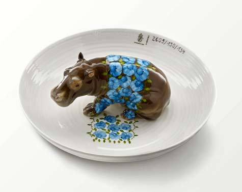 hand-painted-ceramic-bowls-filled-with-detailed-hippos-foxes-and-deer