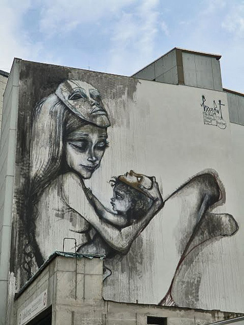 Wall-mural-by-Herakut Herakut-in-Frankfurt,-Germany