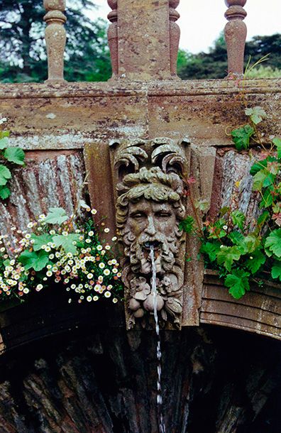 Hestercombe Gardens Arch Fountain, Somerset , England; photo Doyle Herman Design Associates Hestercombe Gardens Arch Fountain - water running from a classical head sculpture