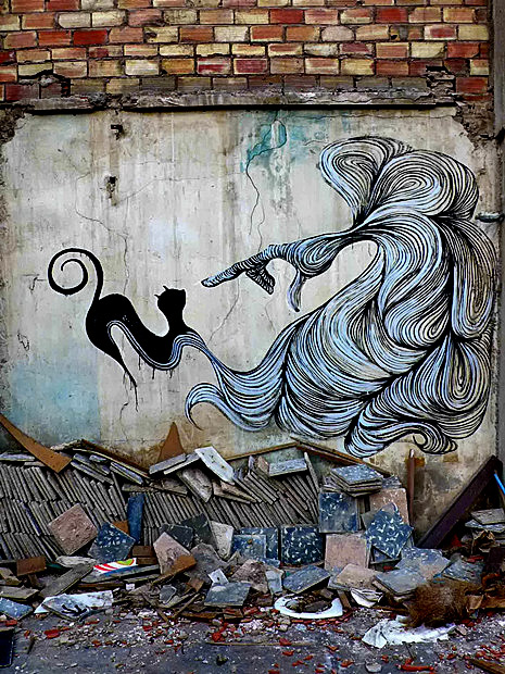 Hyuro-and--Escif-street-art Hyuro-Spain-paints-with-Escif