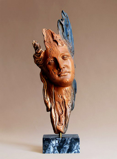 yiannis-nanouris-sculpture-469x641 terracotta raku mask on blue marble base by Yiannis Nanouris