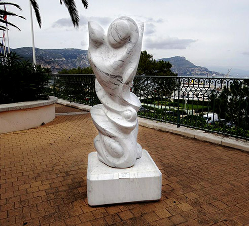 Intuition-Marbre-de-Erickh,-491x446 Intuition - Marbre de Erickh White modern sculpture on a balcony with sea views