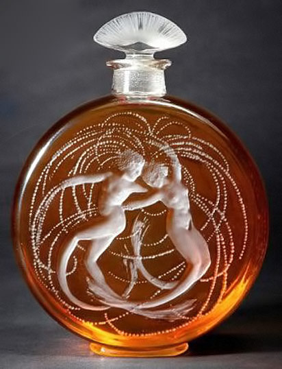 Rene-Lalique-perfume-bottle Rene-Lalique-perfume-bottle amber glass with whit dancing female nudes