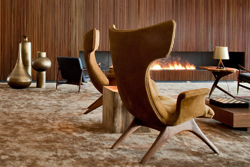 mid-century-decor-502x335 Modern mid century wing back lounge chairs and large gold retro pottery