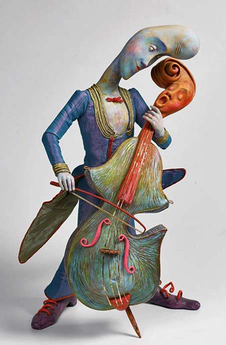 larisa-churkina-figurine larisa-churkina figurine sculpture of a man playing a singing cello