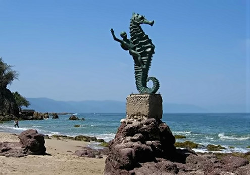 Los-Muertos-Beach-Sculpture-495x347 Los Muertos Beach Sculpture of a boy riding a seahorse
