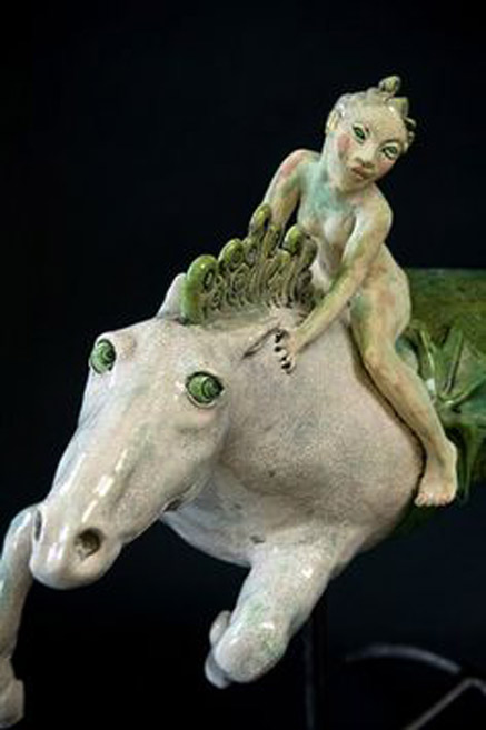 Marie-Prett-horse-and-rider-sculpture Marie-Prett - nude girl riding a white horse with green eyes
