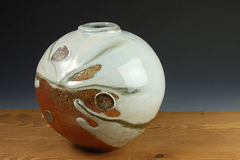Matthew-Blakely-ceramic-globe-vase Matthew-Blakely-ceramic-globe-vase with white sideway drip glaze