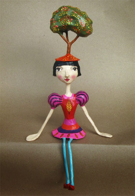 Mauricio-Perez-paper-mache-figure Mauricio-Perez-paper-mache-girl with tree hat