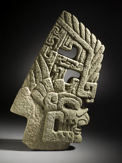 mayan-skull-hacha,-or-axe,-carved-from-basalt-stone.-Mexico,-circa-600---900-CE-—-the-late-Classic-Period axe,-carved-from-basalt-stone.-Mexico,-circa-600---900-CE