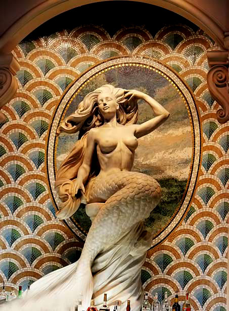 mermaid-sculpture-adorns-the-bar-at-Caesar’s-Palace-Hotel--- Mermaid sculpture with mosaic background at bar at Caesar’s Palace Hotel