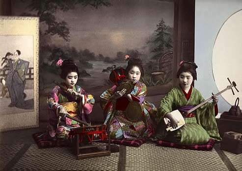 Three-Geisha-Making-Music Miss Taiko, Miss Tzumi, Miss Samisen----Three Geisha playing music in Old Meiji- Era-Japan
