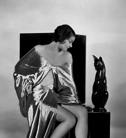 Myrna-Loy,-1931 Myrna-Loy with a black cat sculpture