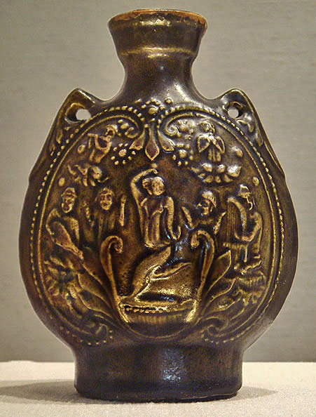 Northern_Qi_jar_with_olive_green_glaze_with_Central_Asian_dancer_and_musicians Nonrthern Qi ceramic flask with Central Asian dancer and musicians