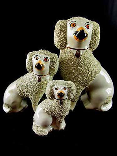Staffordshire-dogs-figurines old-family-of-poodle-Staffordshire-dogs