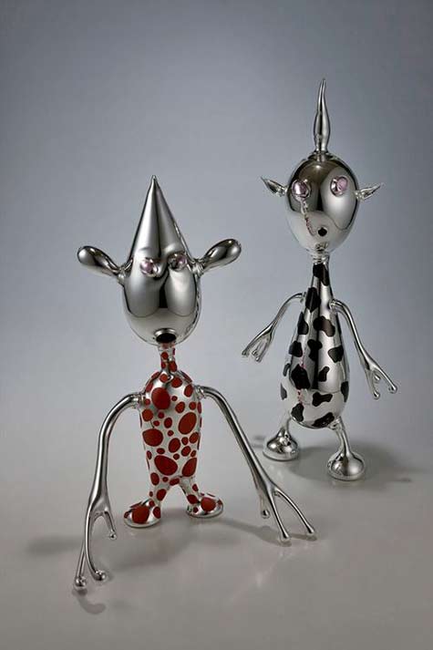 two-alien-figure-sculptures-H-R-Giger Optically-Addicted by H,R,Giger